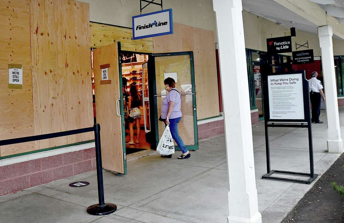 Clinton Crossing Premium Outlet shops were boarded up in anticipation of a credible threat of looting.
