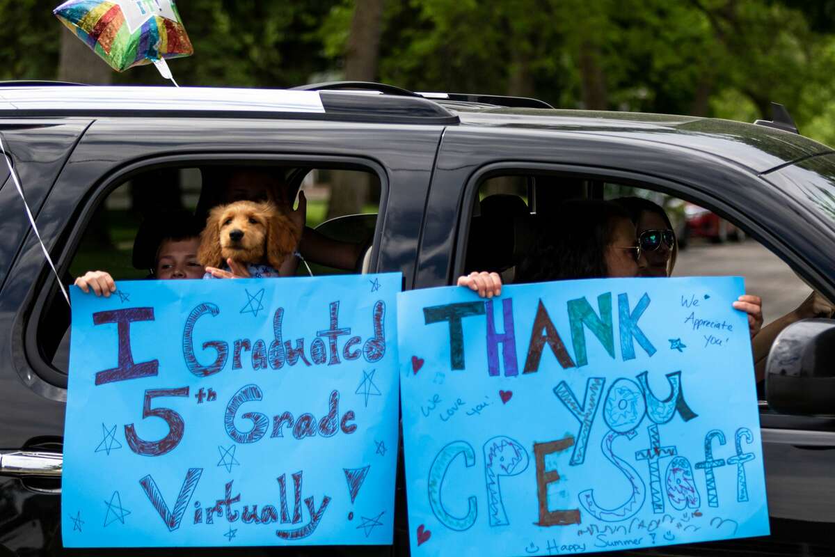 Students and faculty of Central Park Elementary celebrate the end of the school year with a graduation parade Friday, June 5, 2020 at the school. (Cody Scanlan/ for the Daily News)