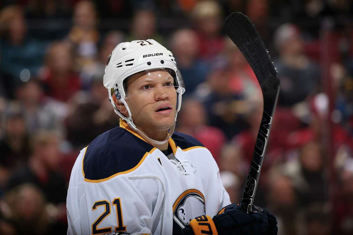 GLENDALE, AZ - FEBRUARY 26: Kyle Okposo #21 of the Buffalo Sabres awaits a face-off during the first period of the NHL game against the Arizona Coyotes at Gila River Arena on February 26, 2017 in Glendale, Arizona. (Photo by Christian Petersen/Getty Images) ORG XMIT: 672874215