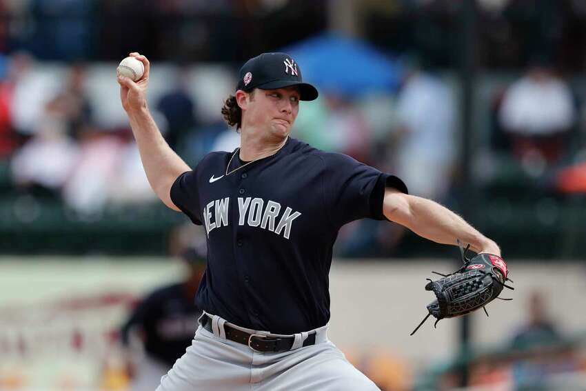 New York Yankees starting pitcher Gerrit Cole throws during a spring training baseball game against the Detroit Tigers, Thursday, March 5, 2020, in Lakeland, Fla. (AP Photo/Carlos Osorio)