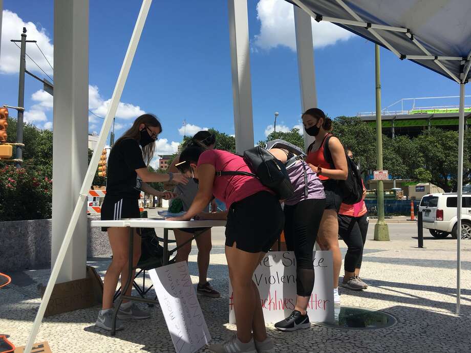 San Antonio residents gathered downtown Saturday afternoon, June 6, 2020, for a eighth day of protests over the death of George Floyd.