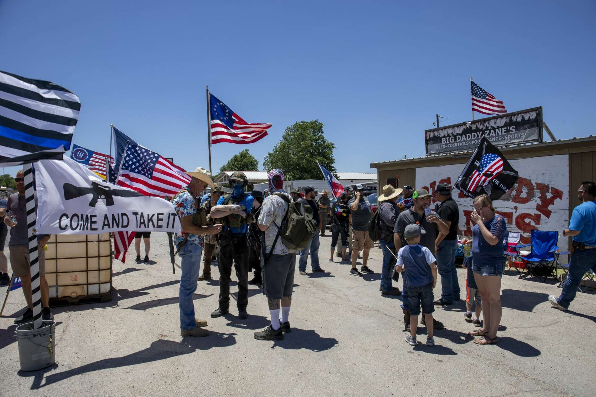 Open Carry Texas members protest outside Odessa bar