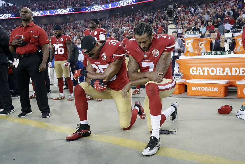 49ers safety Eric Reid (35) and quarterback Colin Kaepernick (7) kneel during the national anthem before a game against the Los Angeles Rams in Santa Clara on Sept. 12, 2016. When Colin Kaepernick took a knee during the national anthem to take a stand against police brutality, racial injustice and social inequality, he was vilified by people who considered it an offense against the country, the flag and the military.