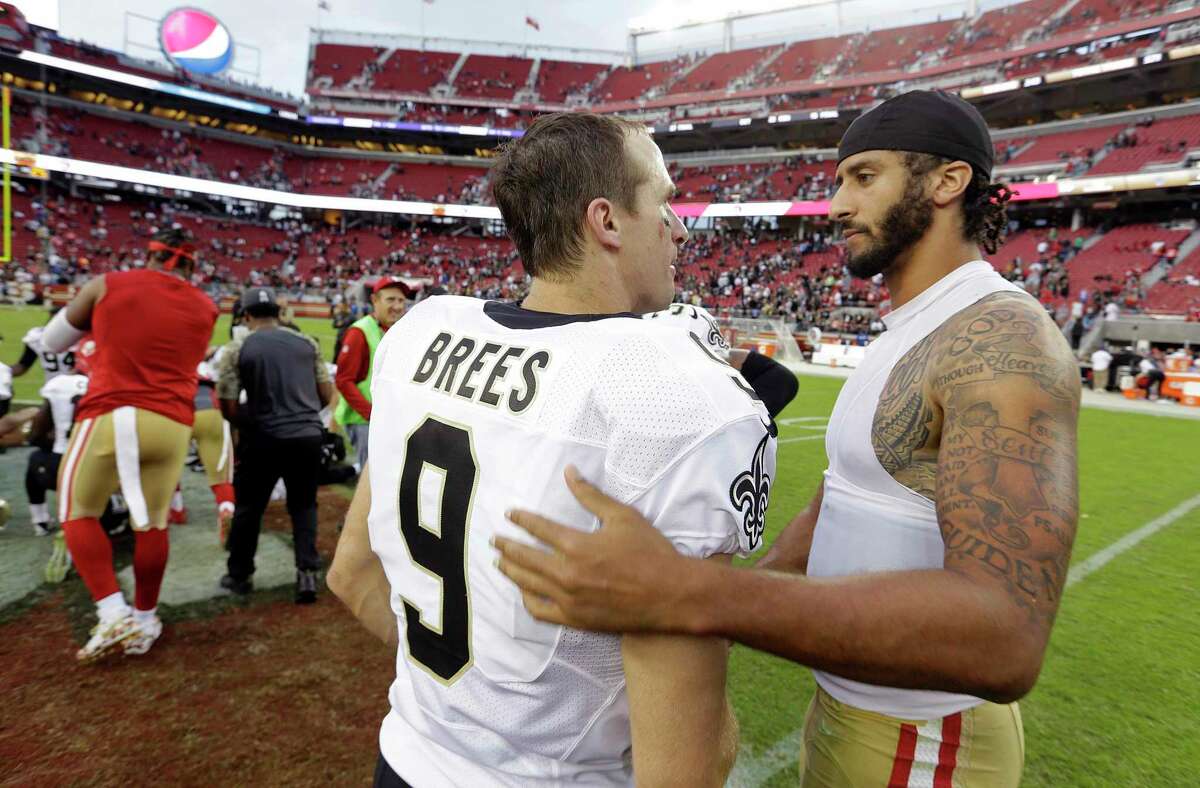 As athletes and sports organizations around the world speak out against racial injustice in the wake of George Floyd’s death, Drew Brees drew sharp criticism after he reiterated his opposition to Colin Kaepernick’s kneeling during the national anthem in 2016. The two QBs are shown after a game in 2016.