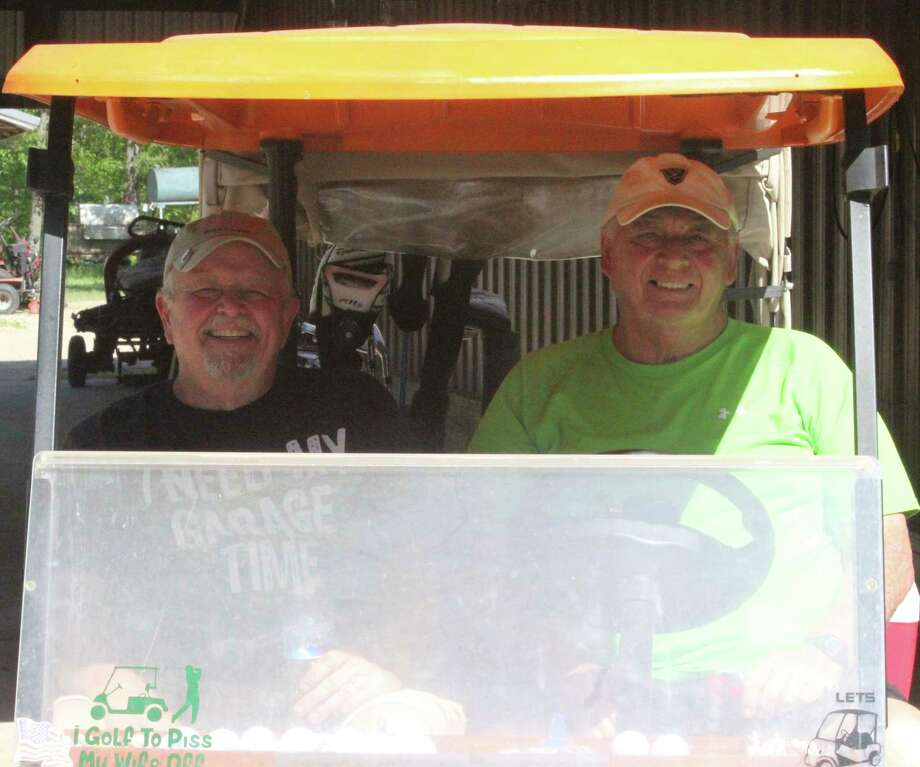 Bruce Williams (left) and Bruce Root get ready to play a round of Thursday Men's League golf at the Intimidator Golf Course near Hawkins. (Pioneer photo/John Raffel)