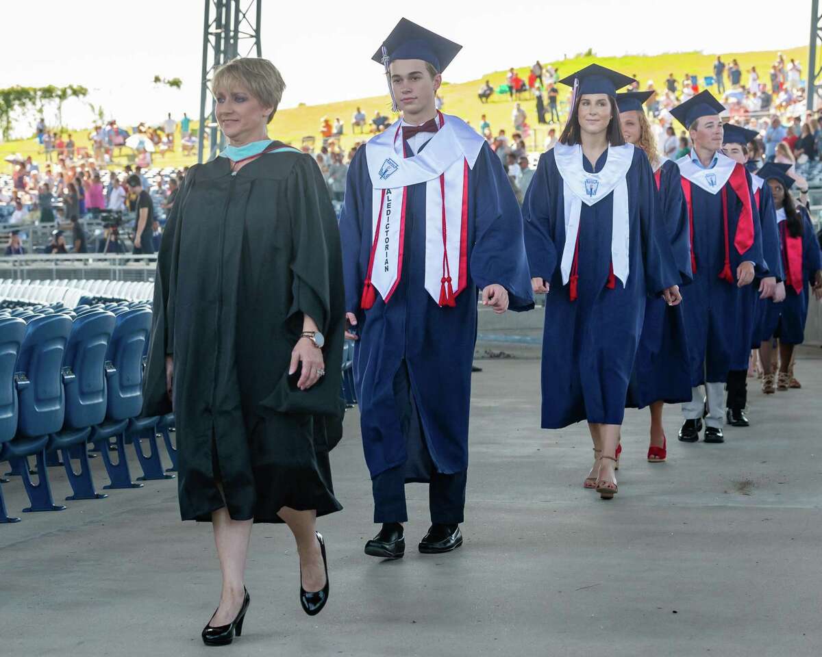 The senior class of Hardin-Jefferson High School processes into the Ford Park Pavilion on Saturday morning for their commencement. Photo made on June 6, 2020. Fran Ruchalski/The Enterprise