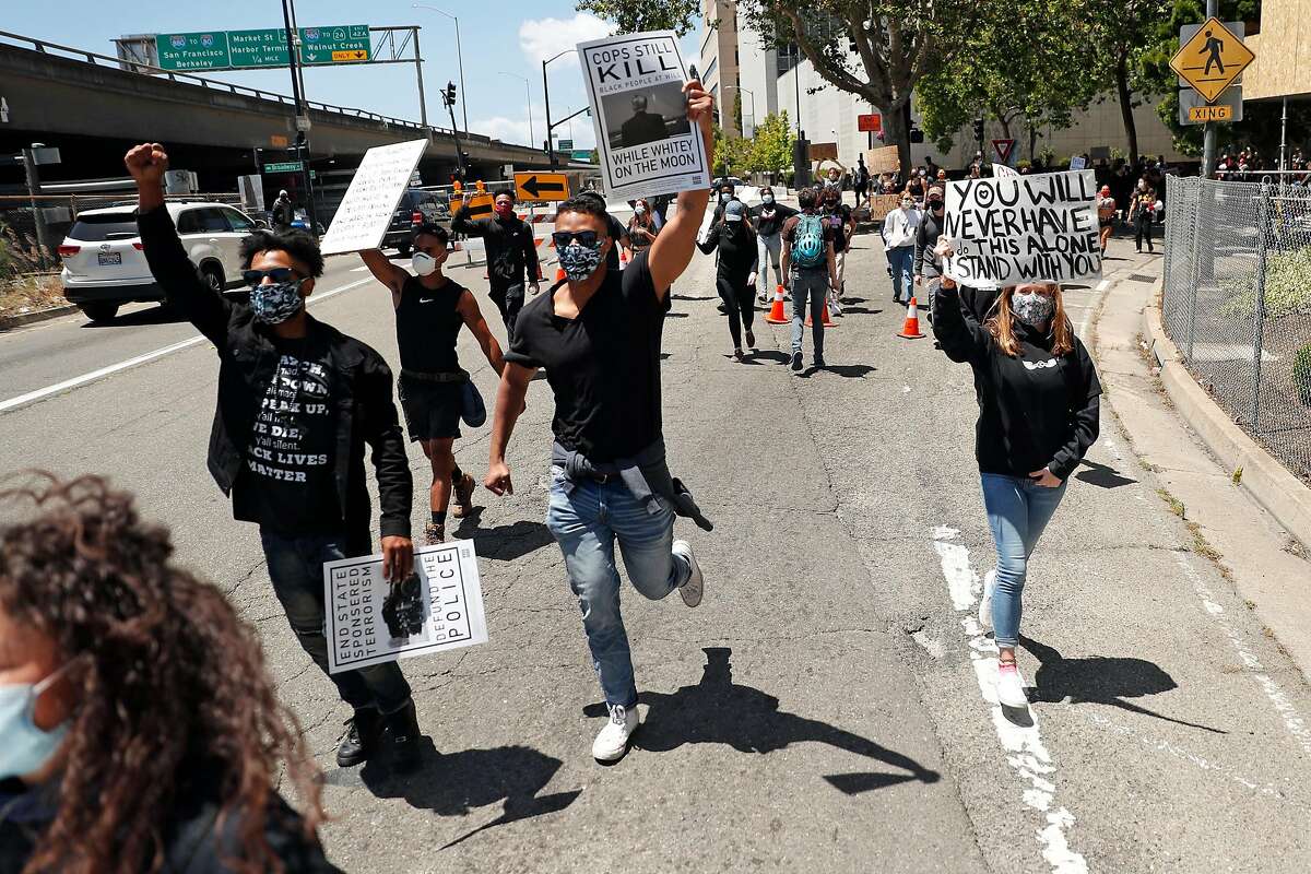 Kids march in Oakland, Vallejo protesters pull a coffin as