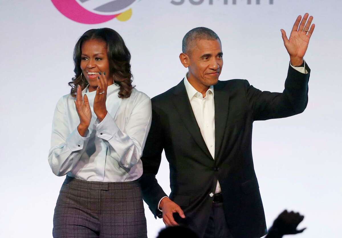 Obamas deliver virtual speech photo