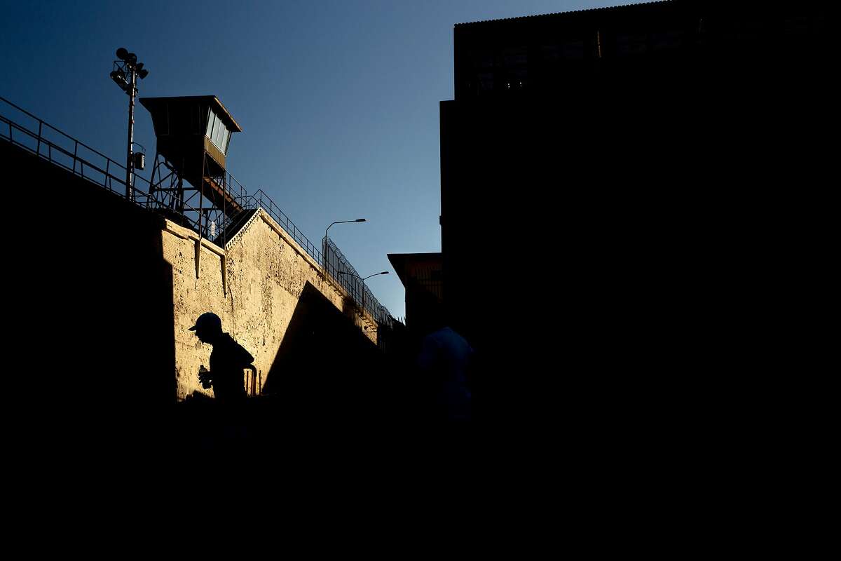 Darrell Mora runs in the San Quentin State Prison marathon on Friday, Nov. 22, 2019, in San Quentin, Calif.