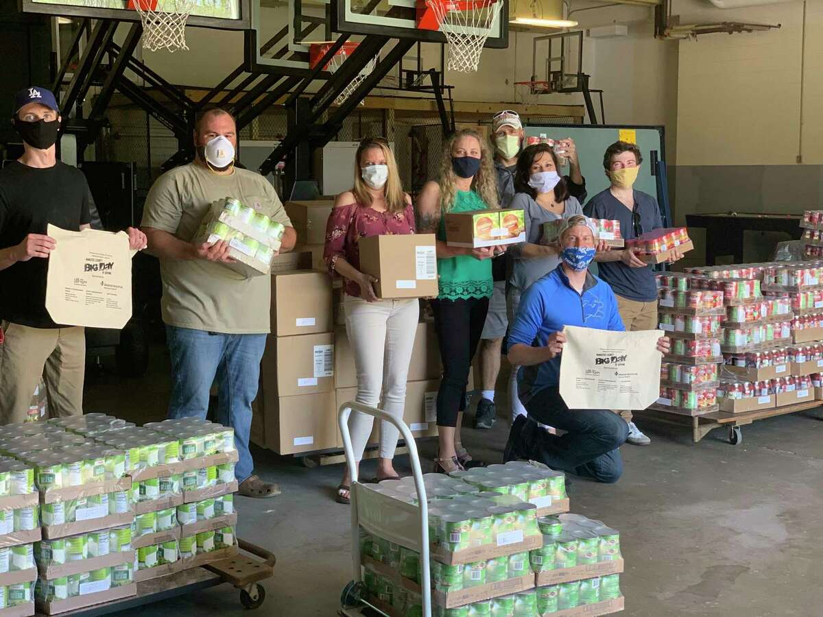 This year's Manistee Area Chamber of Commerce Leadership program members gave out 6,500 pounds of food to community members during the Big Day of Serving on Saturday. (Courtesy Photo)
