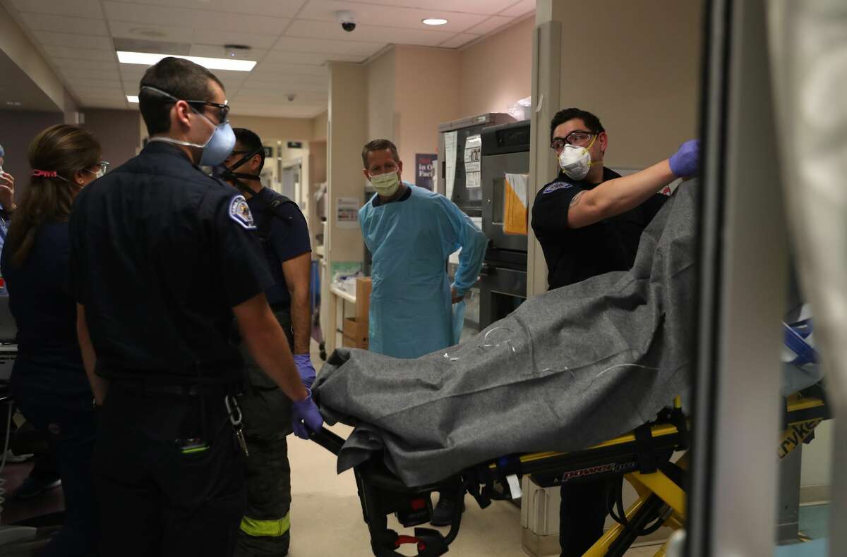 Paramedics drop off a patient in the emergency room at Regional Medical Center on May 21, 2020 in San Jose, California.