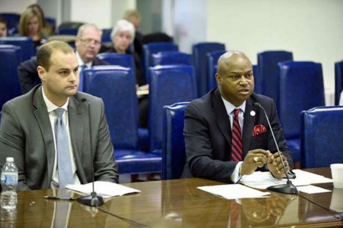 Edwardsville attorney Dustin Maguire, left, and State Rep. Emanuel “Chris” Welch testified at a House committee hearing in favor of House Bill 3904, which would allow college athletes to hire agents and make money through endorsements. The bill passed the House but has not yet been called for a vote in the Illinois Senate.