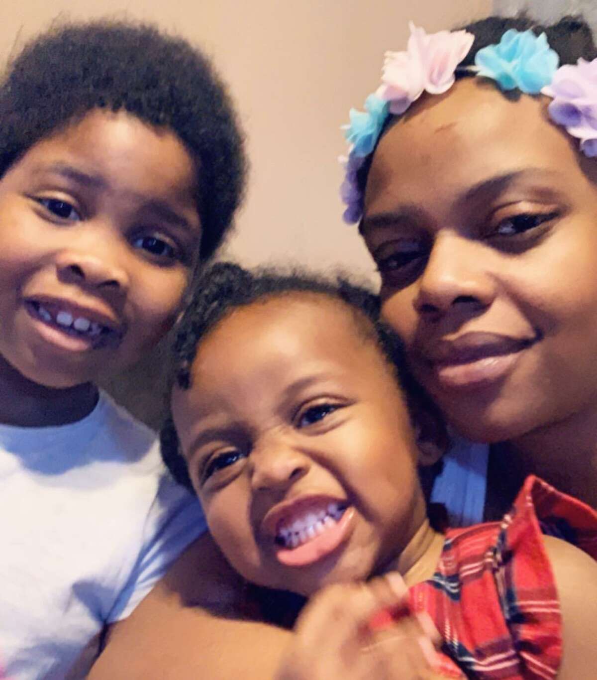 Christina Jones, with her children, one of whom is battling cancer. The team at Circle of Care, she says, is “just like family.”