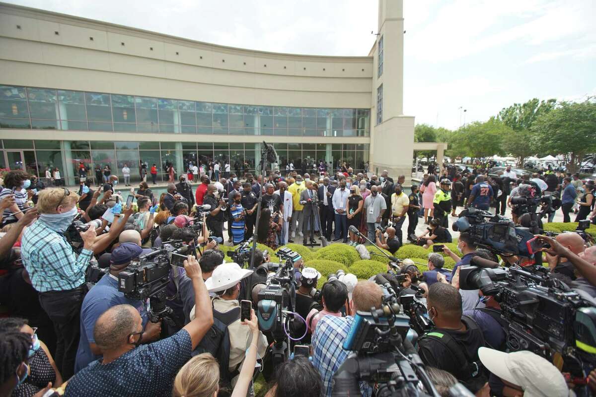 The Rev. Al Sharpton speaks to reporters outside of the public viewing for George Floyd on Monday, June 8, 2020, at The Fountain of Praise Church in Houston.