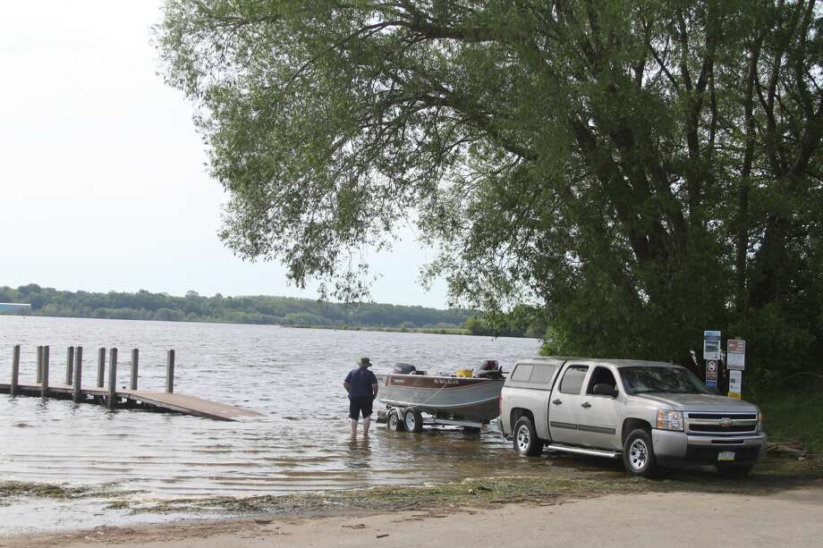 PHOTOS Manistee Lake docks underwater, rain on the way Manistee News