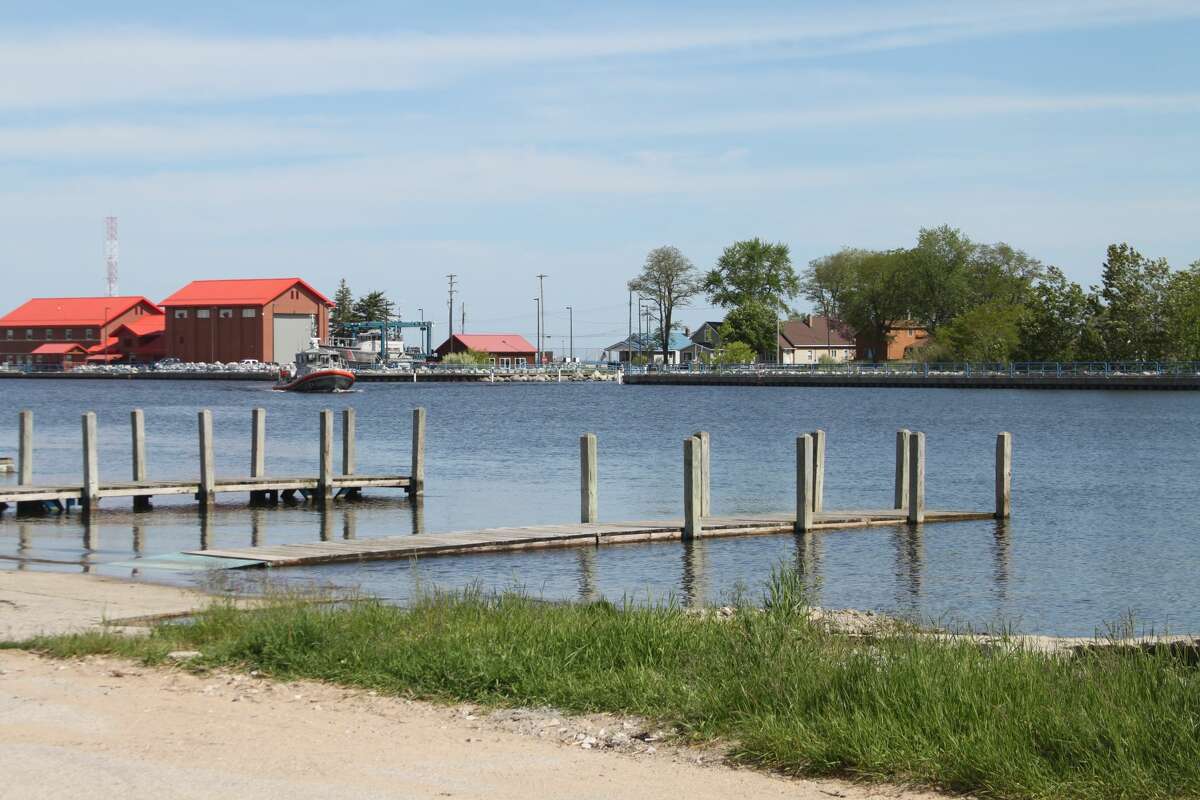 PHOTOS Manistee Lake docks underwater, rain on the way