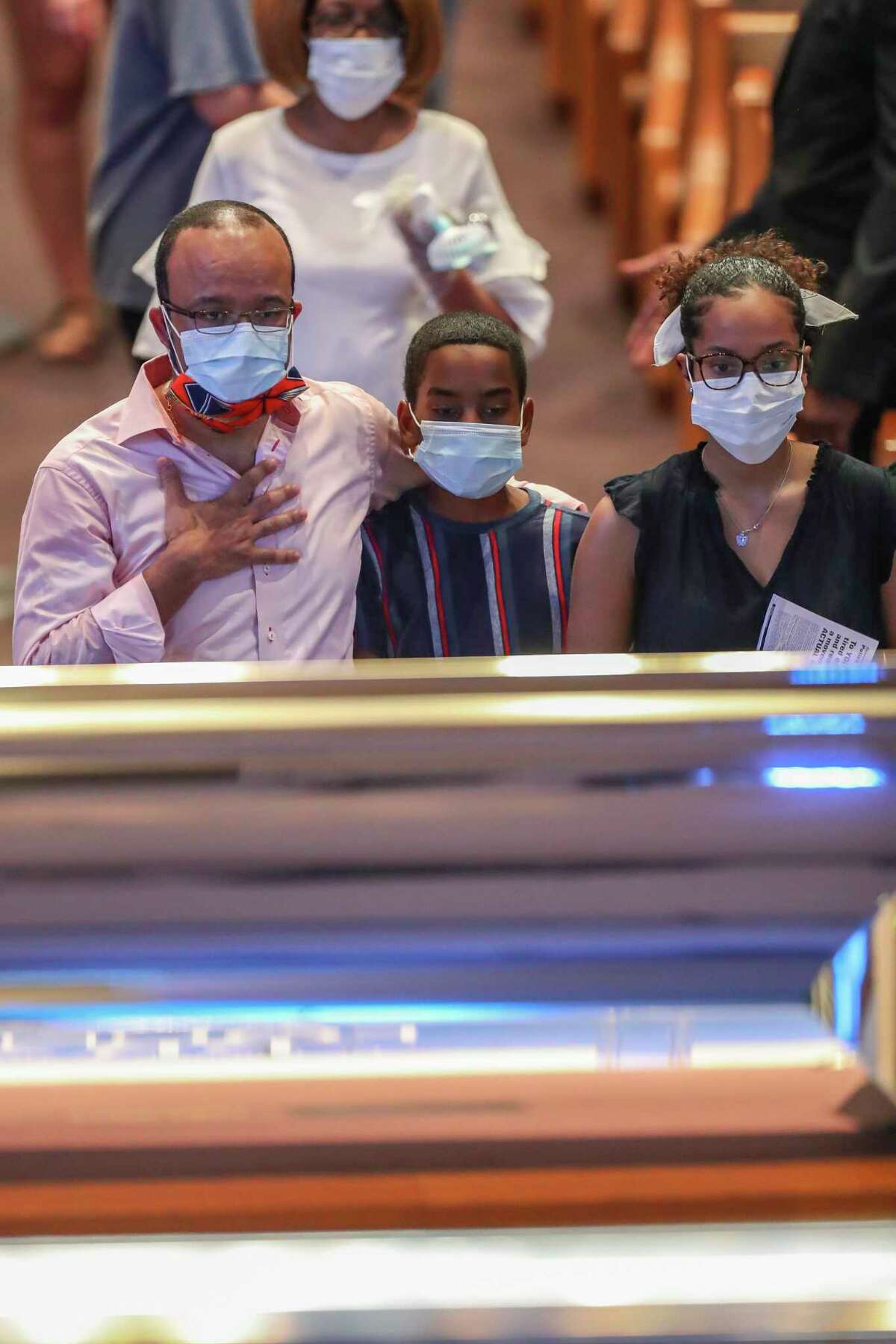 Mourners view the casket of George Floyd during a public visitation Monday, June 8, 2020, at The Fountain of Praise church in Houston. Floyd died after being restrained by Minneapolis Police officers on May 25.