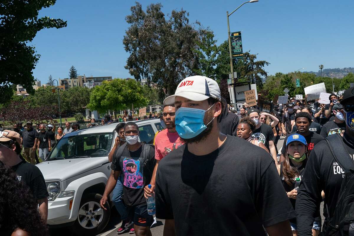 Klay Thompson walks around Lake Merritt to protest the killing of George Floyd by Minneapolis Police on Wednesday, June 3, 2020 in Oakland, Calif.