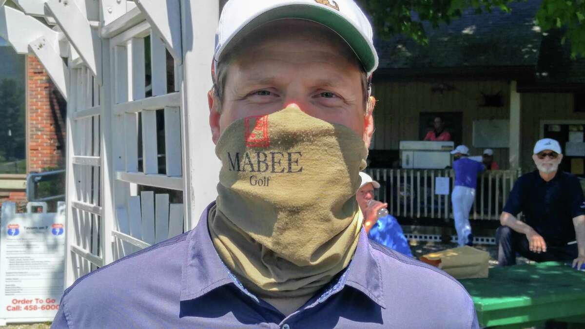 Eric Maybe of the Country Club of Pittsfield shows his personalized mask Monday, June 8, 2020, during the Northeastern New York PGA Pro-Pro at Waubeeka Golf Links in Williamstown, Mass. Because of the COVID-19 pandemic, this marked the section's first event of the season. (Pete Dougherty/Times Union)