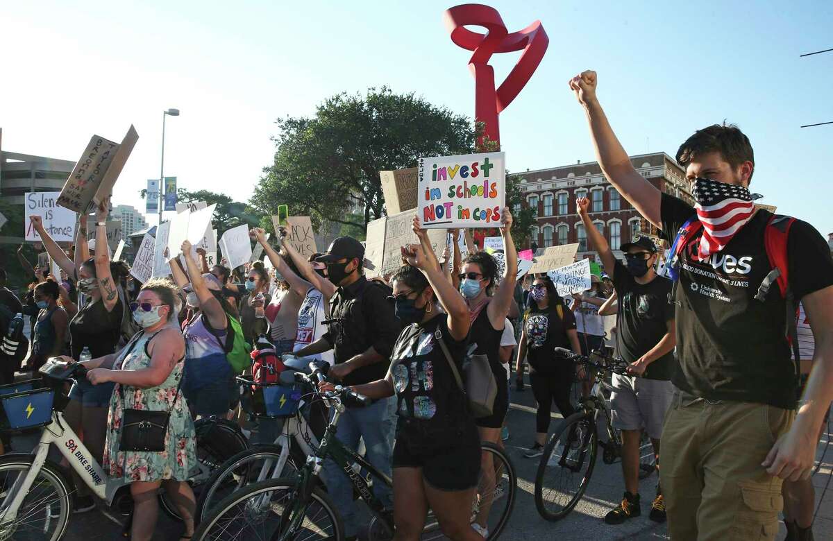 The Young Ambitious Activists group organized Monday’s march from the Blue Star Arts Complex to La Villita and Hemisfair Plaza.