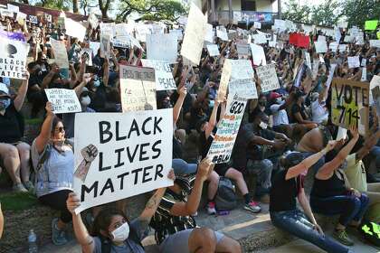 The Young Ambitious Activists group organized Monday’s march from the Blue Star Arts Complex to La Villita and Hemisfair Plaza.