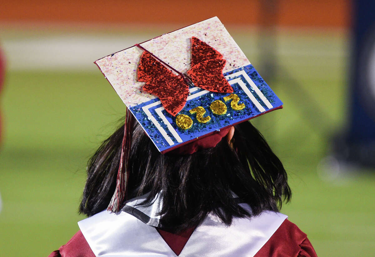The Hector J. Garcia Early College High School graduating class of 2020 holds its commencement ceremony outdoors Monday, Jun 8, 2020, at Shirley Field. The high school graduation was the first in Laredo since Texas eased COVID-19 coronavirus pandemic restrictions.