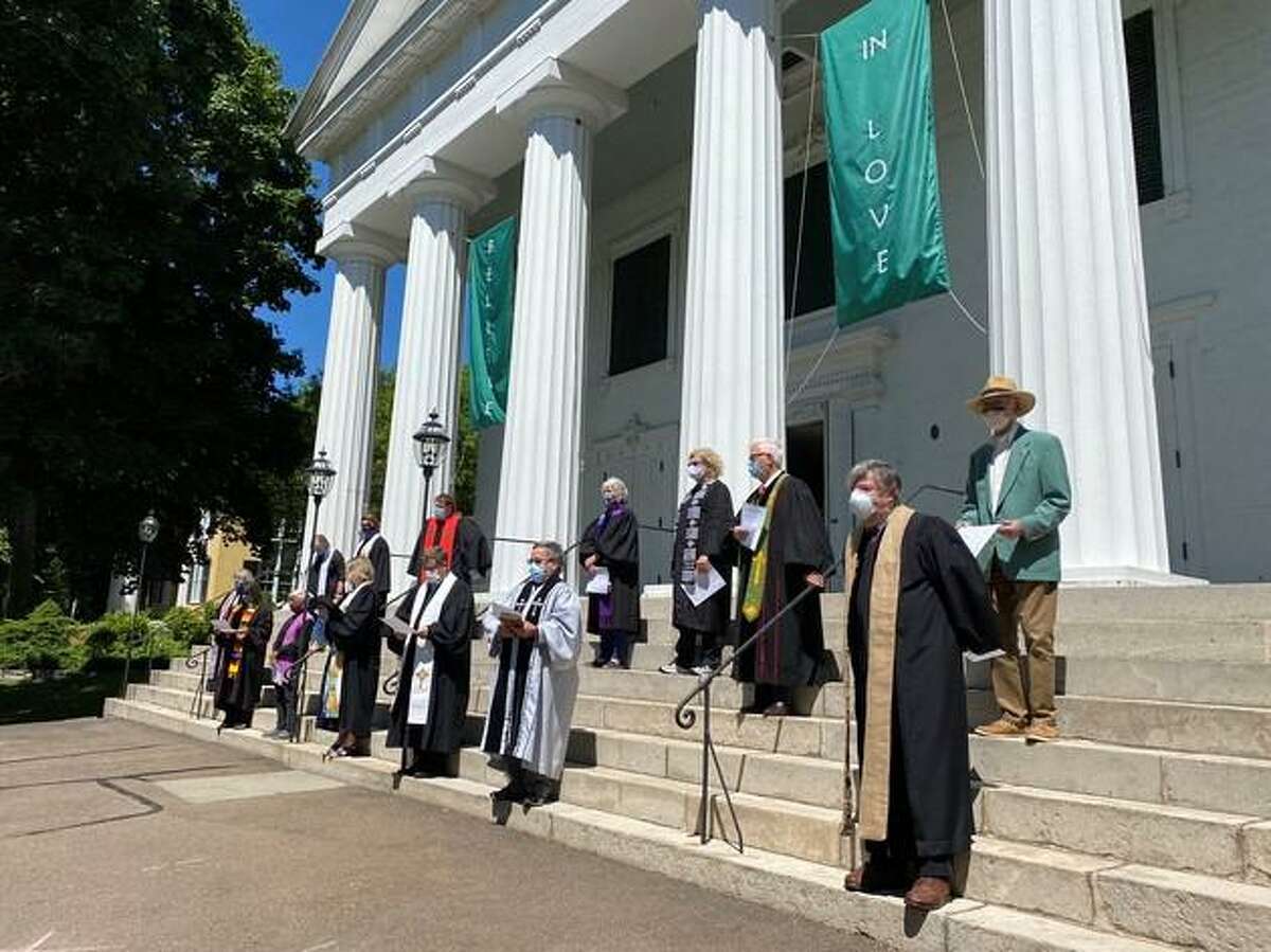 Clergy of the United Church of Christ churches east of New Haven gathered on the steps of the First Congregational Church of Madison on Monday to denounce the killing of George Floyd and other African Americans as well as systemic racism.