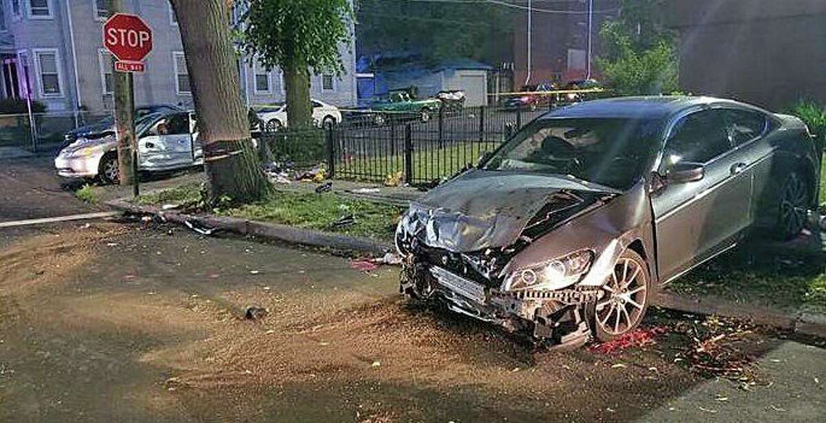 The aftermath of a crash around 2 a.m. at the intersection of Brooks and Jane streets in Bridgeport, Conn., on Tuesday, June 9, 2020. One person died and other suffered serious injuries.