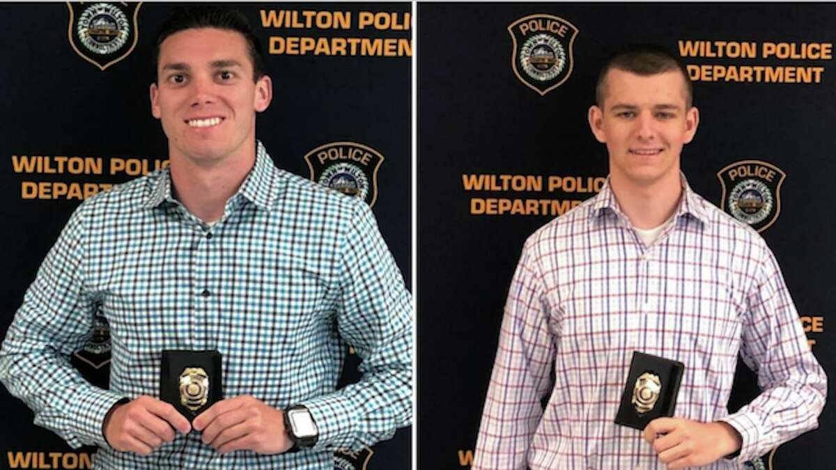 Steven Anuszkiewicz of New Canaan, left, and Matthew Cisewski of New Fairfield, right, were newly sworn in as Wilton police officers on June 9. They will be attending the Connecticut Police Academy in Meriden starting June 12.