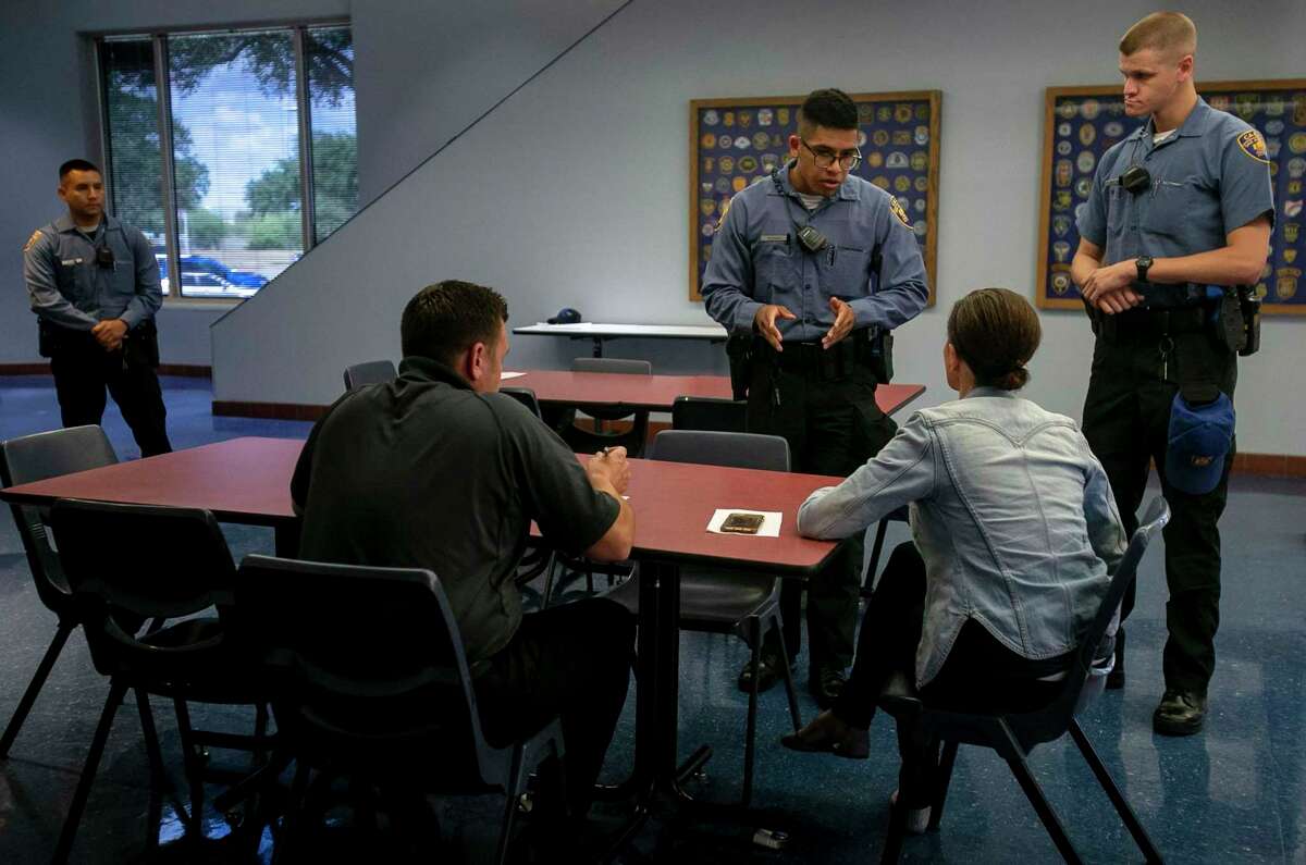 San Antonio Police Academy Cadets JosŽ Bernal, left, and Anthony Bellm, participate in a role playing exercise while Officer Joe Smarro observes as part of a weeklong Crisis Intervention Training (CRIT) at the San Antonio Police Training Academy in San Antonio, Texas, Sept. 18, 2019. Smarro and Ernie Stevens, two members of the SAPD's Mental Health Unit, are featured in an upcoming HBO documentary titled "Joe and Ernie," which looks at efforts by the pair and the SAPD to increase training and knowledge of mental health issues. "It's compassion and empathy," says Smarro. "If you're not coming from a place of authenticity and sincerity, they can see right through that."