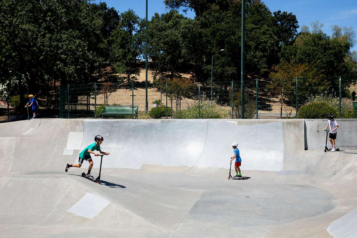 Kids play at the skate park at Heather Farm Park in Walnut Creek, Calif. Tuesday, June 9, 2020. They Bay Area is opening at a fairly fast pace, with Contra Costa County announcing plans this week to reopen indoor dining and hair salons soon, while it reports near-record new cases.