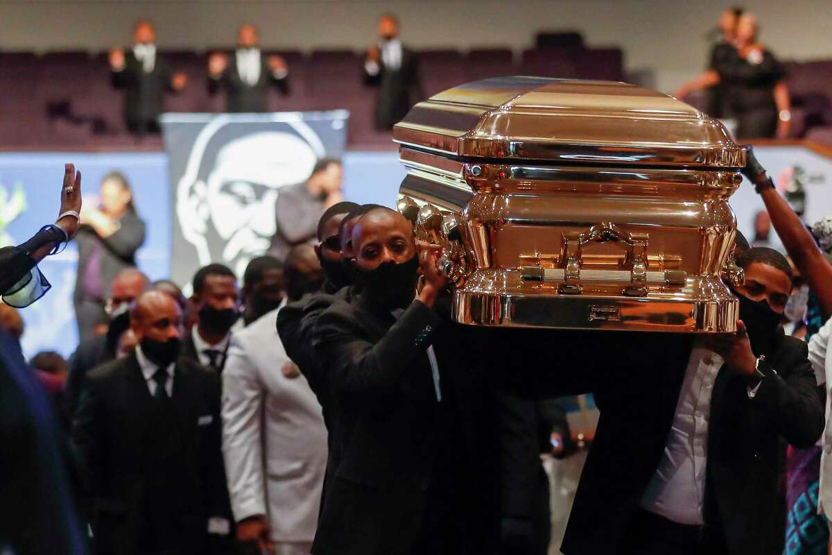 Pallbearers recess out of the church with the casket following the funeral for George Floyd on Tuesday, June 9, 2020, at The Fountain of Praise church in Houston. Floyd died after being restrained by Minneapolis Police officers on May 25.