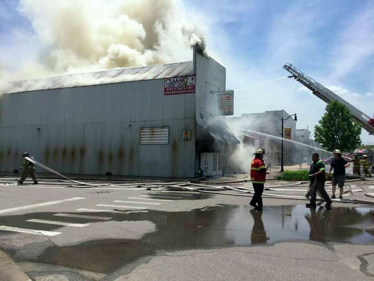 The Evart community is mourning the loss of one of its prominent stores. Evart Fire Chief Shane Helmer said firefighters were dispatched to a fire at the Corner Store shortly before 12:30 p.m. Wednesday. The cause of the fire remains unknown. (Herald Review photo/Alaina Modene)