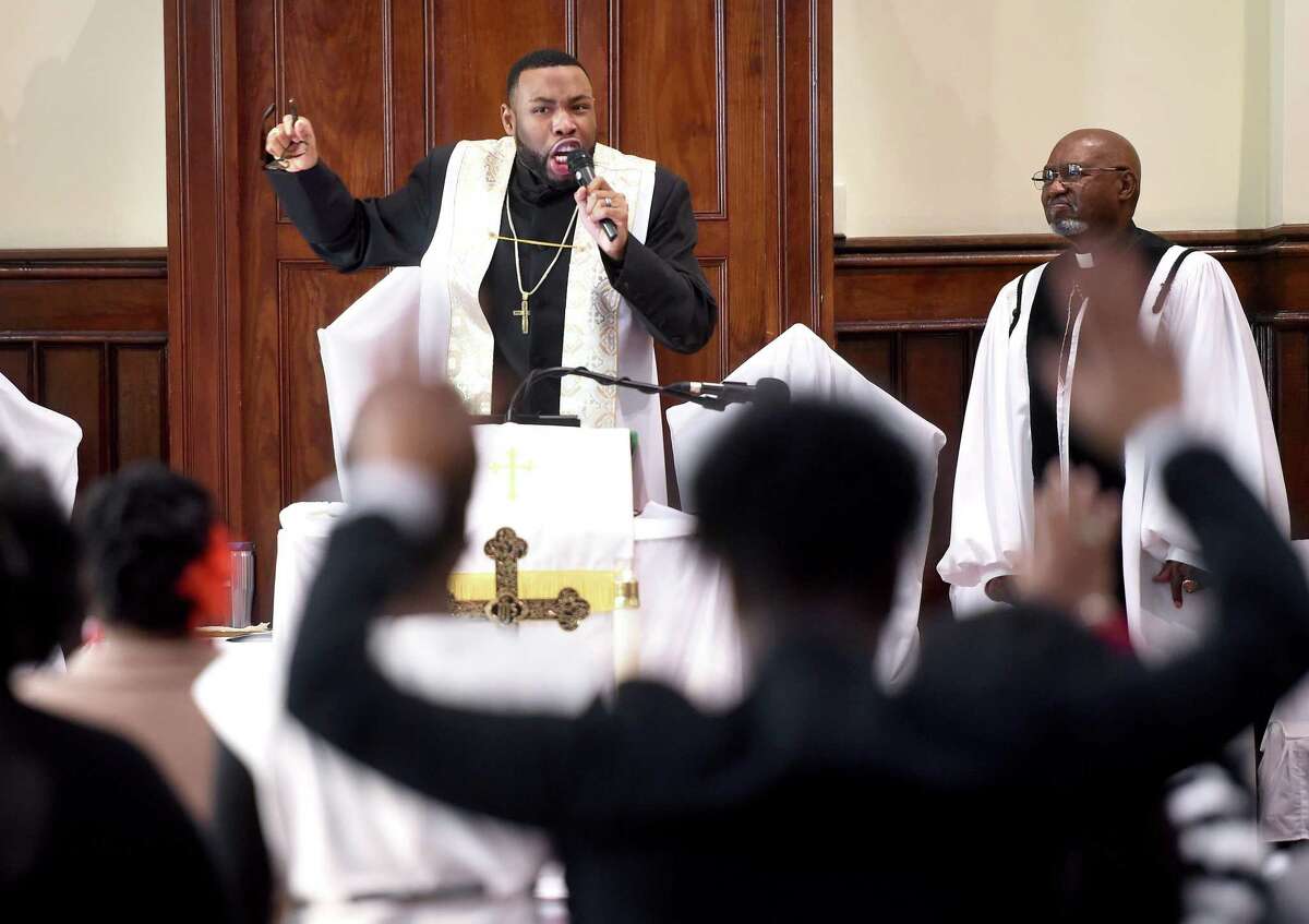 The Rev. Kelcy G.L. Steele leads worshipers at Varick Memorial A.M.E. Zion Church in 2016.
