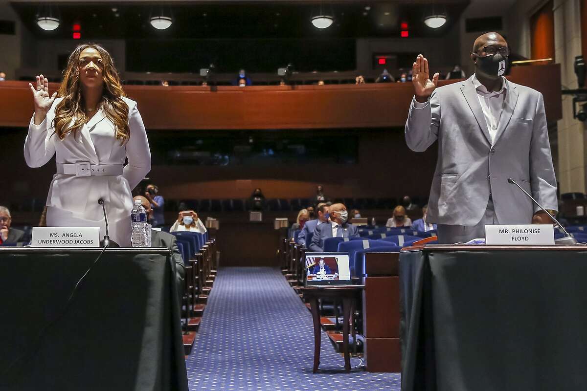Angela Underwood Jacobs, a Lancaster, Calif., city council member, left, and Philonise Floyd, a brother of George Floyd, are sworn in during a House Judiciary Committee hearing on proposed changes to police practices and accountability on Capitol Hill, Wednesday, June 10, 2020, in Washington. (Michael Reynolds/Pool via AP)