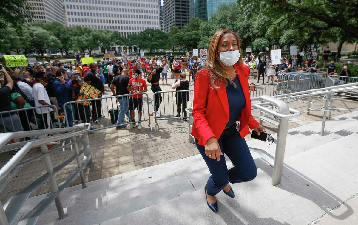 Council Member at Large 4 Letitia Plummer heads back to City Hall after she addressed a rally to report the City Council voted against amendments to eliminate police misconduct to the city budget Wednesday, June 10, 2020, in Houston.