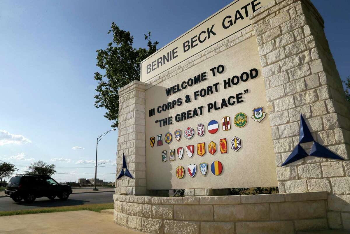 Traffic flows through the main gate past a welcome sign in Fort Hood, Texas. Defense officials are considering renaming Army bases and facilities named after Confederate leaders.