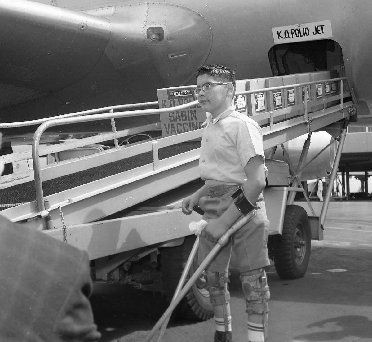 Polio victim Larry Montoya, is at the airport for the arrival of cases of the Sabin vaccine, which be distributed as par of the KO Polio campaign, September 5, 1962