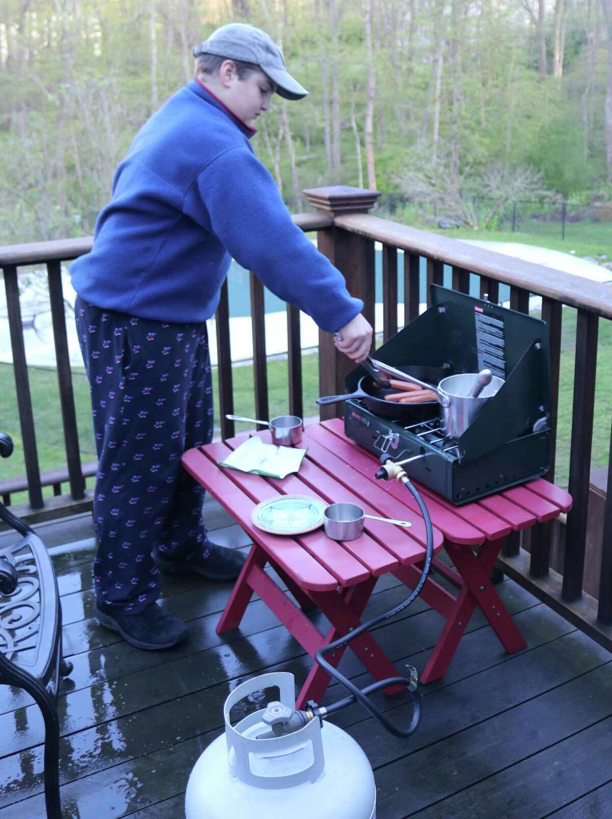 Outdoor cooking was among the skills Boy Scouts in New Canaan Boy Scout Troop 70 honed when they held a virtual campout recently amid the coronavirus pandemic. They also came together online to share their experiences.