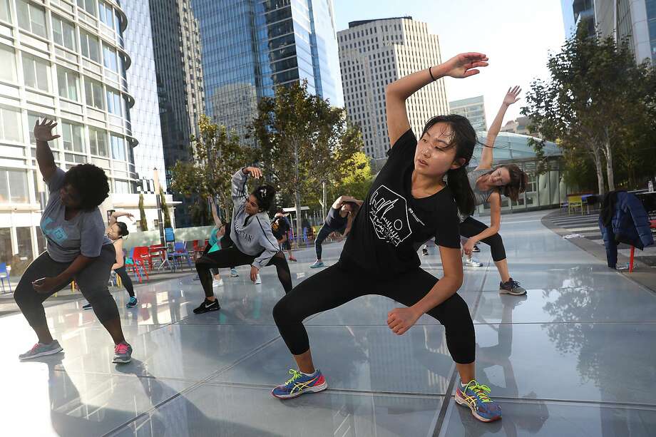 A free cardio zumba dance class offered by Fitness SF on the rooftop Salesforce Park in 2018. Photo: Liz Hafalia / The Chronicle