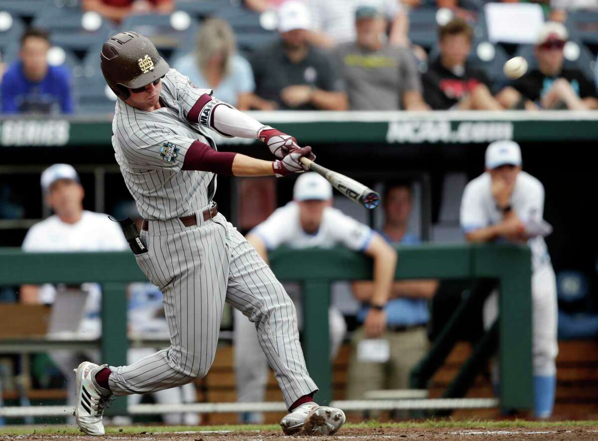 Mississippi State designated hitter Jordan Westburg of New Braunfels hits a grand slam against North Carolina in the second inning of an NCAA College World Series baseball game in Omaha, Neb. The Baltimore Orioles selected Westburg in the draft.