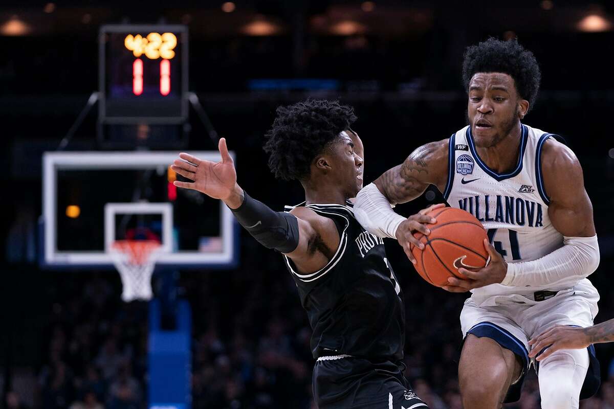 Villanova’s Saddiq Bey (right), shown against Providence’s David Duke, is an option for the Warriors with his winning pedigree, defensive versatility and offensive efficiency.