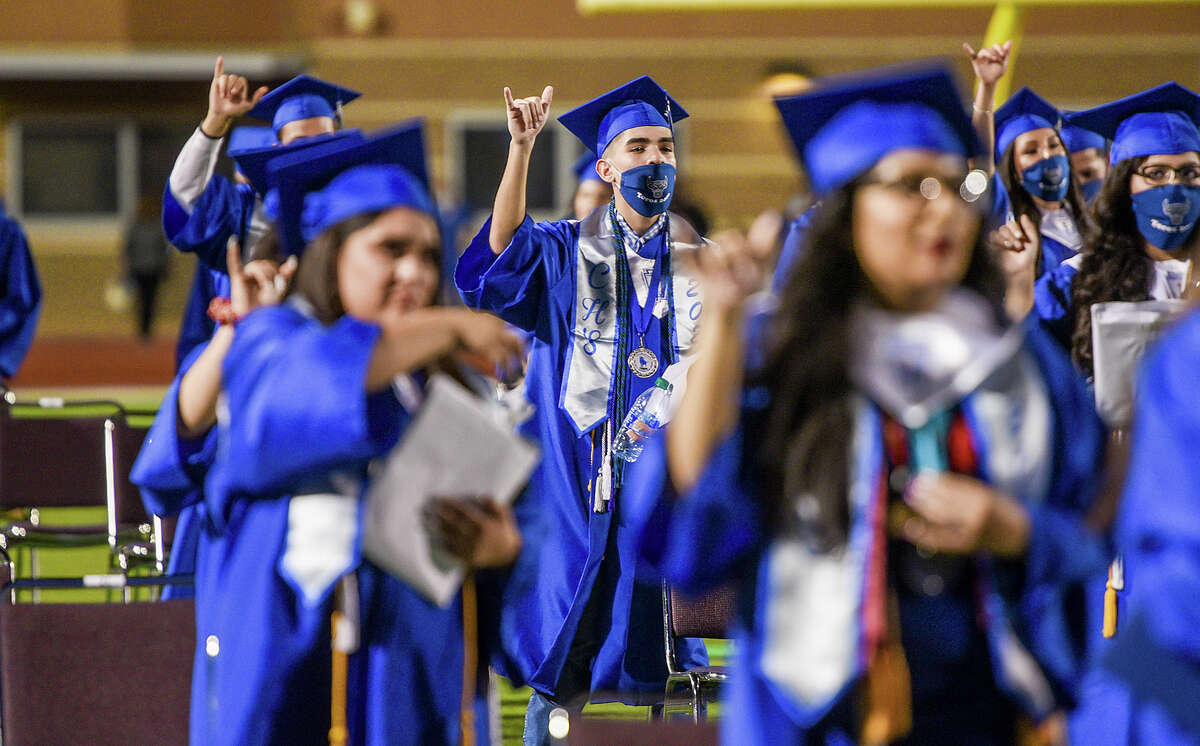 The Cigarroa High School graduating class of 2020 has its commencement ceremony outdoors Monday, Jun 8, 2020, at Shirley Field as Texas eases on COVID-19 coronavirus restrictions.