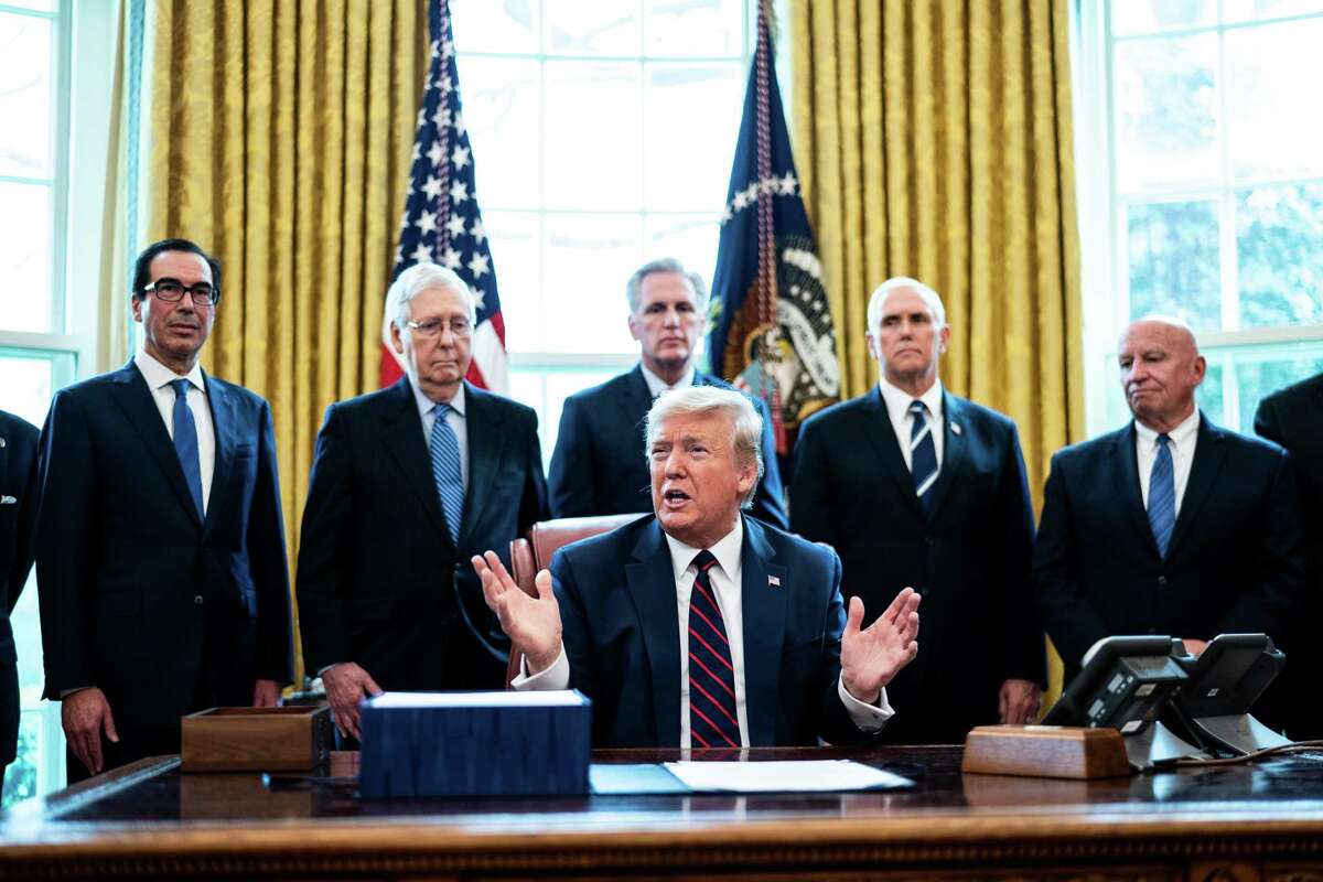 WASHINGTON, DC - MARCH 27: U.S. President Donald Trump speaks during a bill signing ceremony for H.R. 748, the CARES Act in the Oval Office of the White House on March 27, 2020 in Washington, DC. Earlier on Friday, the U.S. House of Representatives approved the $2 trillion stimulus bill that lawmakers hope will battle the the economic effects of the COVID-19 pandemic. (Photo by Erin Schaff-Pool/Getty Images)