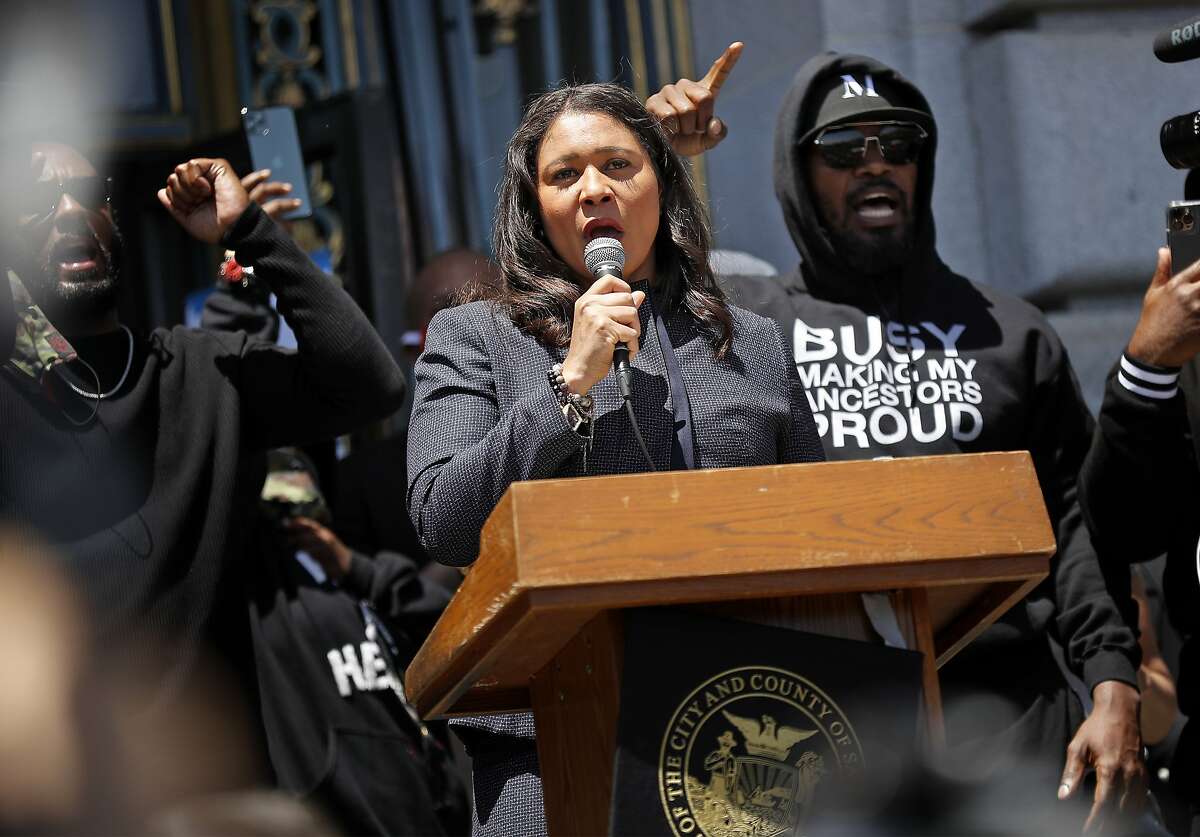 San Francisco Mayor London Breed speaks as Jamie Foxx reacts during "Kneel-In" protest at City Hall in San Francisco, Calif., on Monday, June 1, 2020.
