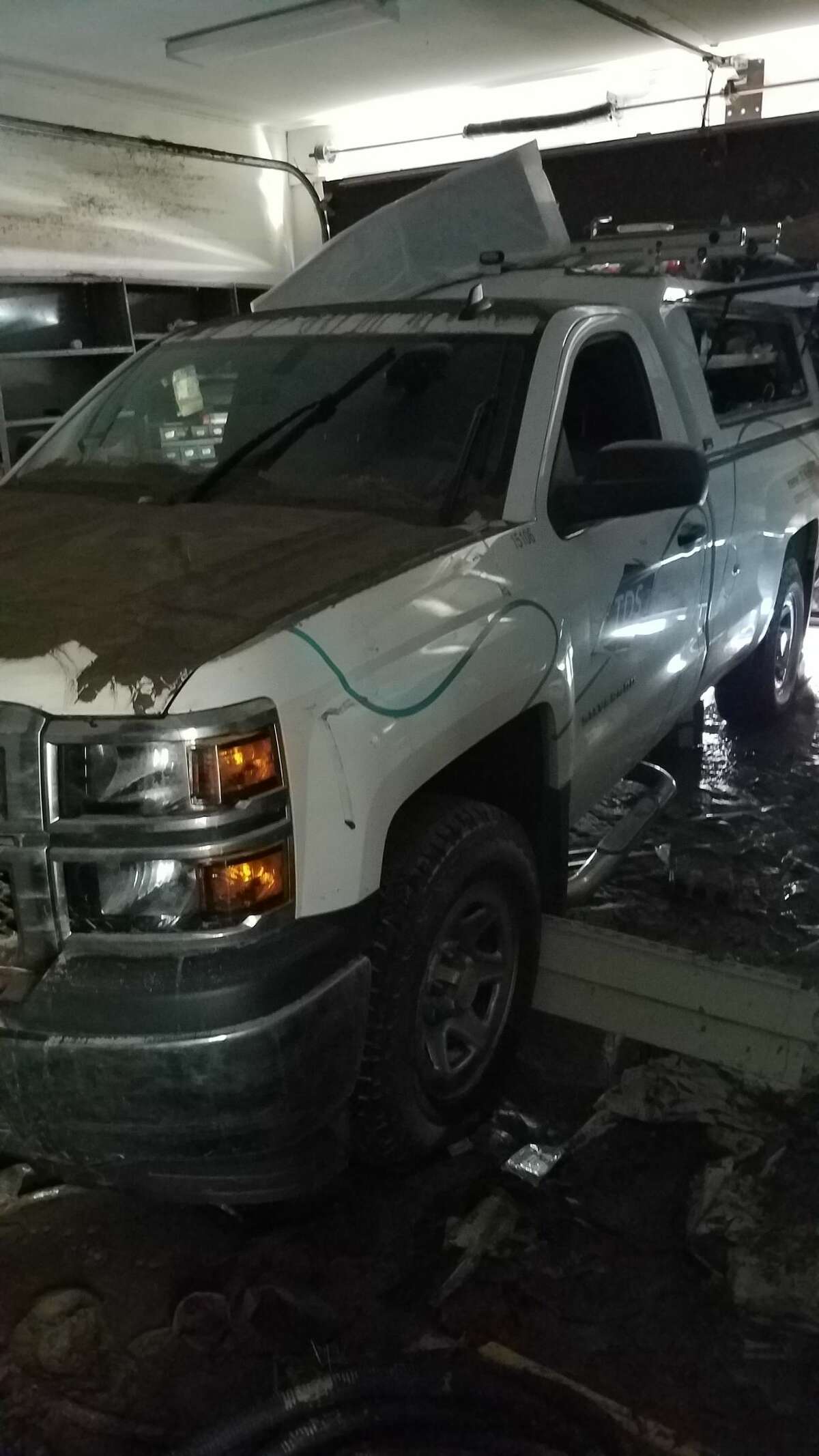 TDS Telecom teams have worked daily to create a new hub for equipment to restore phone and internet service to Sanford area residents after a heavy rain event wiped out the company's central office. Pictured is a company truck that was in a pole barn during the flood. (Photo provided/TDS Telecom)
