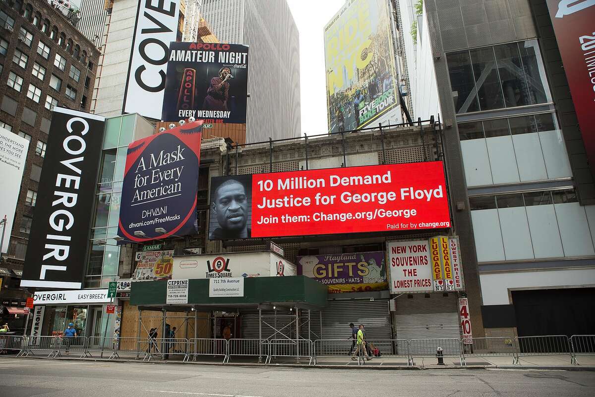 Change.org has spent money to buy billboards in New York and Minneapolis, including this one in Times Square, to promote a petition seeking justice for George Floyd. Undated photo provided June 11, 2020, in New York City, NY.