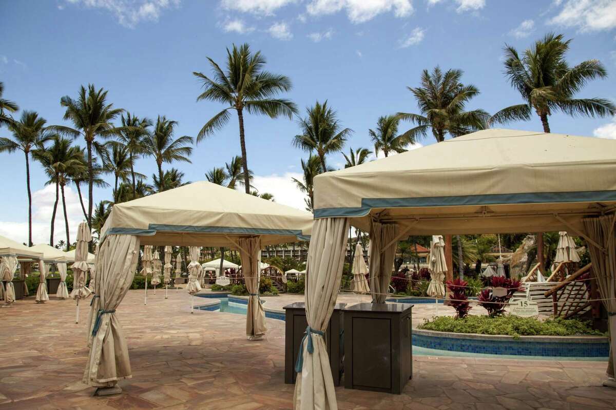A pool area is closed at a Waldorf Astoria Resort, in Wailea, Hawaii on April 26, 2020.