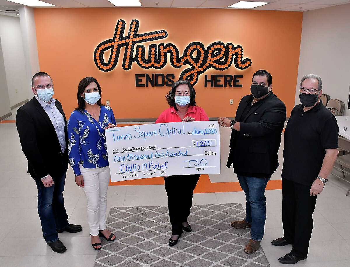 South Texas Food Bank Executive Director Alma Boubel, center, was presented with $1,200 donation from Carlos and Elsa Fuentes and Rene Garza of Times Square Optical, Thursday, June 11, 2020. Also pictured is Angelo Piccirillo, right, responsible for Business-Economic Development at The Business-Economic Development Center at TAMIU.