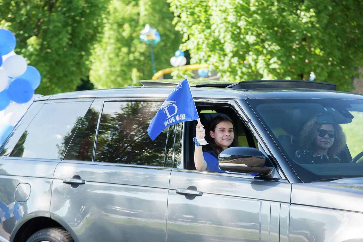 Darien High held a wave-through graduation car parade for the Class of 2020 seniors on the morning of June 12, after postponing it due to weather from June 11.